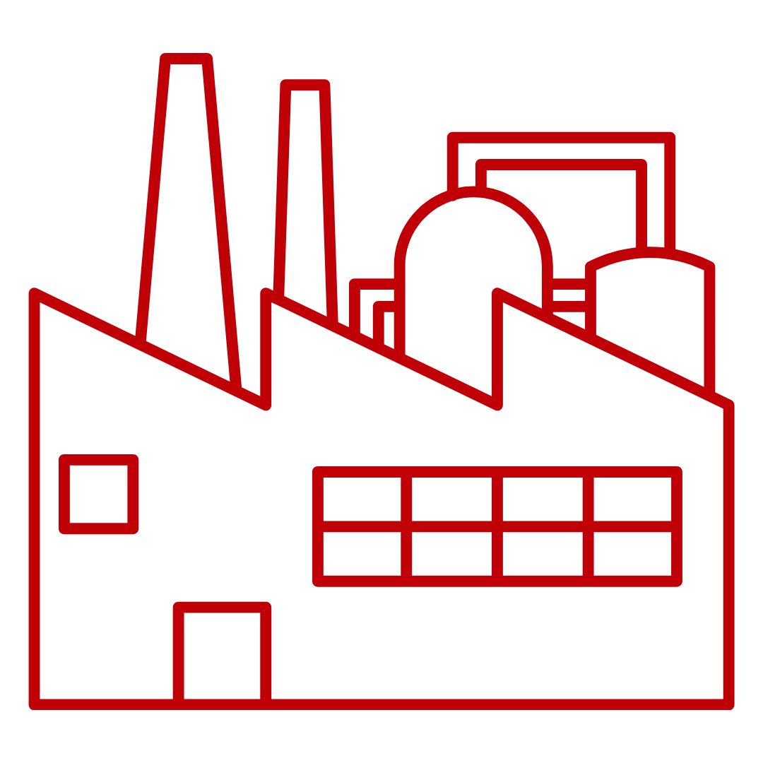 Red icon of a factory with two smokestacks, industrial tanks, and a jagged roofline, representing manufacturing or industrial production