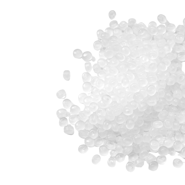 A pile of translucent white plastic pellets used as raw material for plastic manufacturing