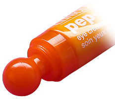 Close-up of an orange Clinique Pep-Start eye cream tube with a rounded applicator tip and visible product branding