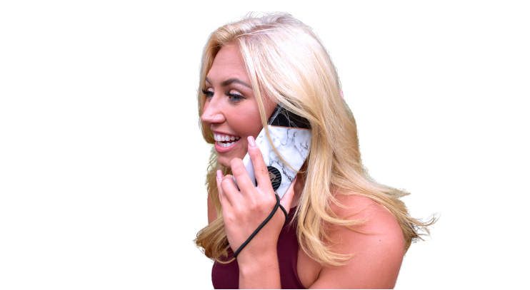 Smiling woman with long blonde hair talking on a smartphone with a white marble-patterned case