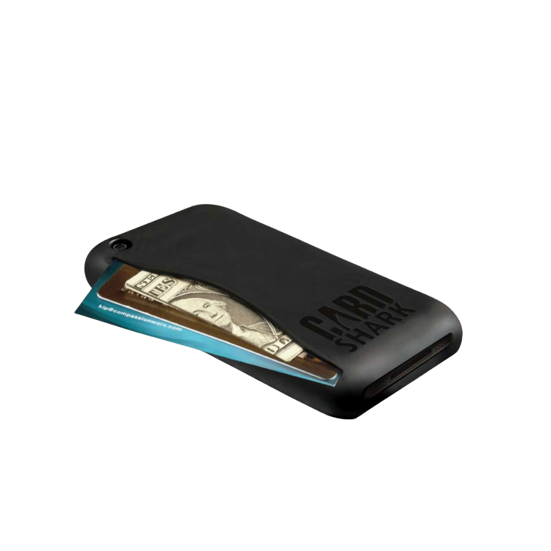 A black phone case labeled "CARD SHARK" with a built-in cardholder slot containing a folded dollar bill and a blue card