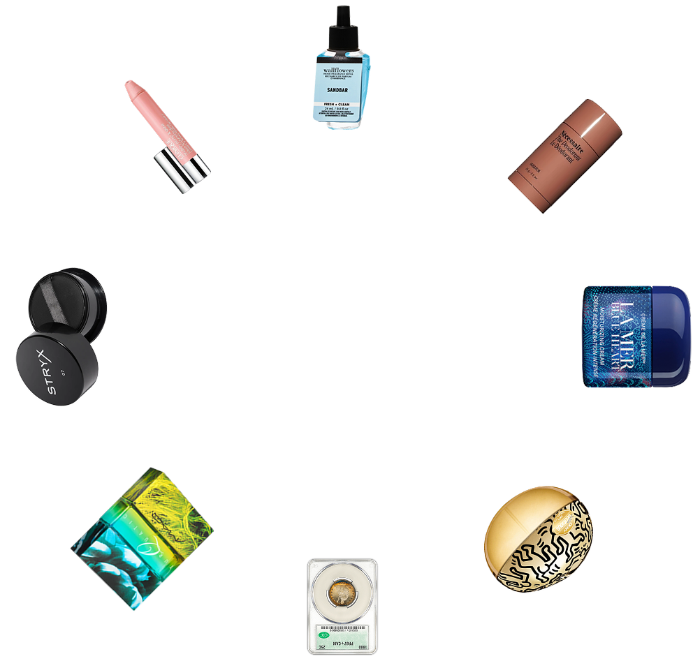 A circular arrangement of assorted cosmetic and grooming products on a light gray background, including lip balm, fragrance, concealer, and skincare items from various brands